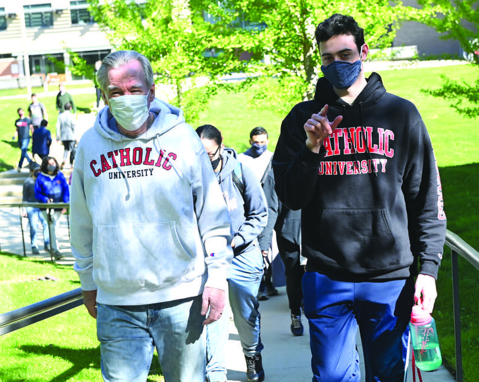 President Garvey leads students as they head out for a day of service in honor of Earth Day 2021