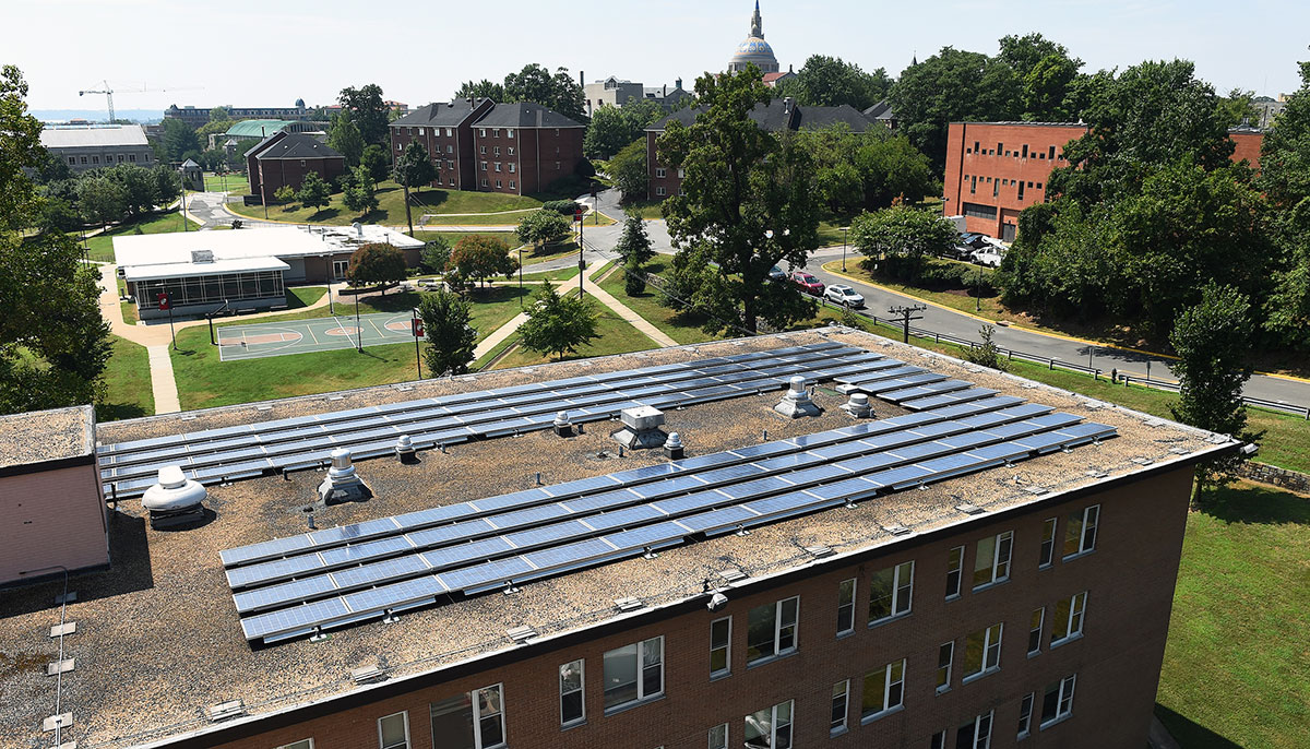 Solar panels on top of a campus building